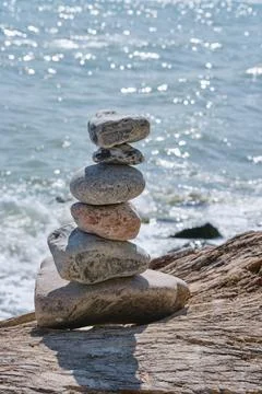 View of stone tower on the beach and sea as background Foto stock
