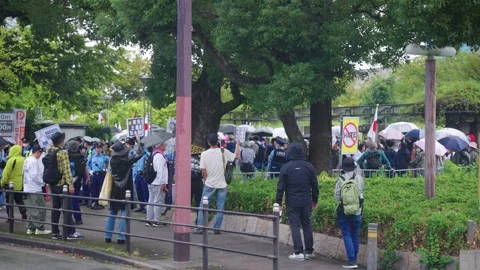 View of "Stop Hate" Signs and Counter Protesters at Anti Immigration Protest Stock Footage 321519245