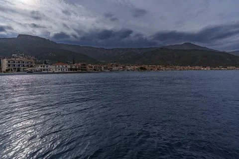 View of storm clouds over the sea and mountains Stock Photos