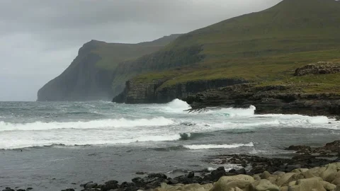 View of stormy surf from the village of Eiði in the Faroe Islands. Stock Footage 154552221
