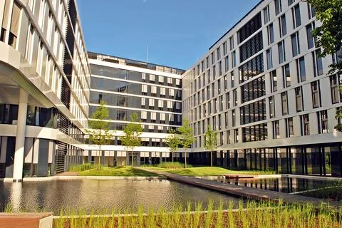 A view at a straight facade of a modern building Stock Photos