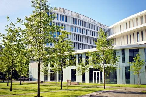 A view at a straight facade of a modern building Stock Photos