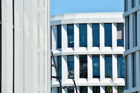 A view at a straight facade of a modern building Stock Photos