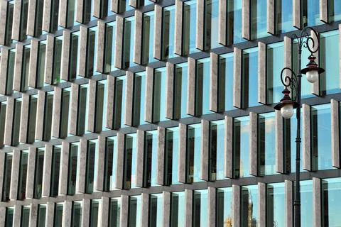A view at a straight facade of a modern building Stock Photos