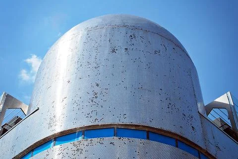 A view at a straight facade of a modern building Stock Photos