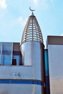 A view at a straight facade of a modern building Stock Photos