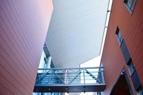 A view at a straight facade of a modern building Stock Photos