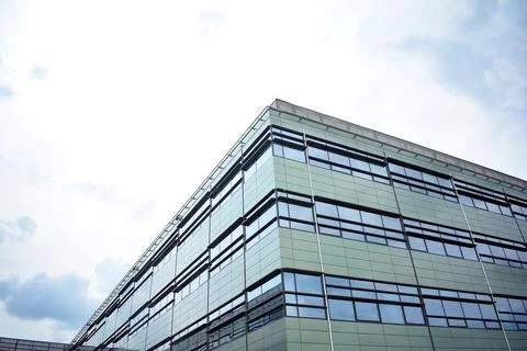 A view at a straight facade of a modern building Stock Photos