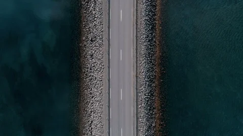View of straight road or bridge in iceland Stock Footage 104800550