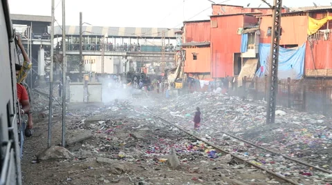 View on street full of garbage during a train ride in Mumbai. Stock Footage 49568339