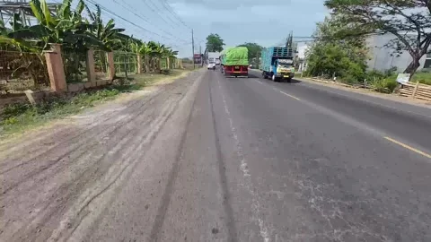 View of a street in Pati district, Central Java, Indonesia Stock Footage 334837626