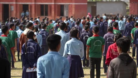 View of students gathered for a school assembly in Dhangadhi, Nepal. Video stock 335477088