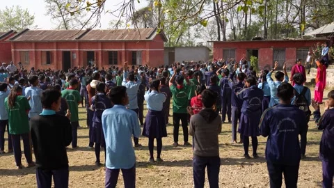 View of students in uniforms during a school assembly, Nepal. Video stock 335477138
