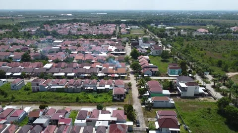 View of subsidized and commercial housing in Banjarmasin which is dense and.. Stock Footage 283888663