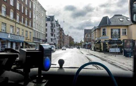 View of suburbia from inside a public shuttle bus Stock Photos
