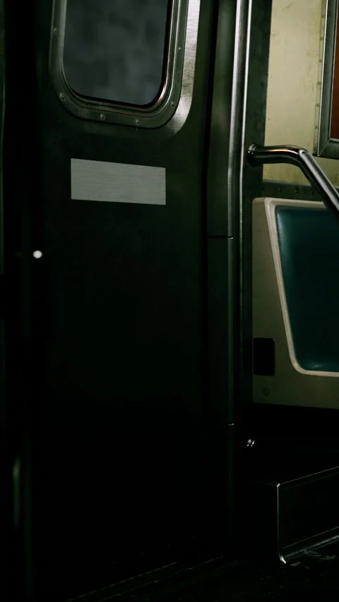 View of a subway train interior with empty seats and metal details Stock Footage 342178010