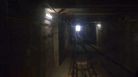 View of a subway tunnel as seen from the front of a moving train Stockbeeldmateriaal 81545747