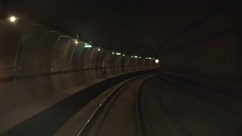 View of subway tunnel as seen from head of moving train. Fast underground train Stock Footage 134384251