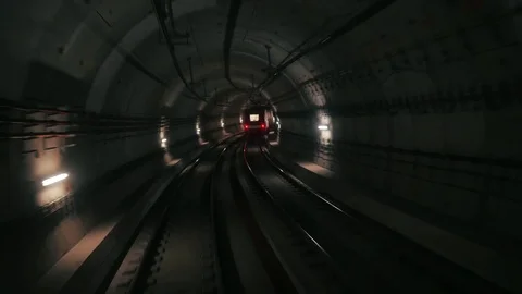 View of subway tunnel as seen from reverse of moving backward train. Fast Video stock 81628091