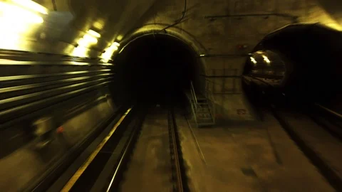 View of subway tunnel as seen from reverse of moving backward train. Stock Footage 111680889