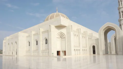 View of the Sultan Qaboos Grand Mosque from arched passageway Stock Footage 99268516