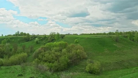 View of a summer landscape and summer cloudy skies Stock Footage 160363452