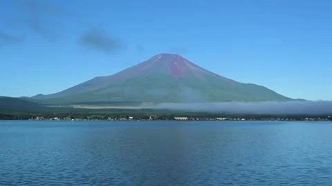 View of summer Mount Fuji and blue sky from lake Yamanaka, Yamanashi Prefecture Stock Footage 249639627