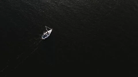 View on the summer sunset on the river with white boat Stock Photos