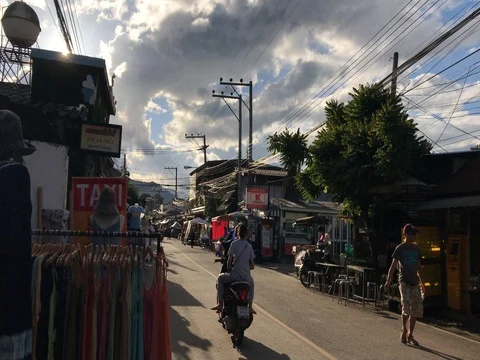 View of summer sunset on Walking Street in Pai, Thailand at sunset Stock Footage 79191218