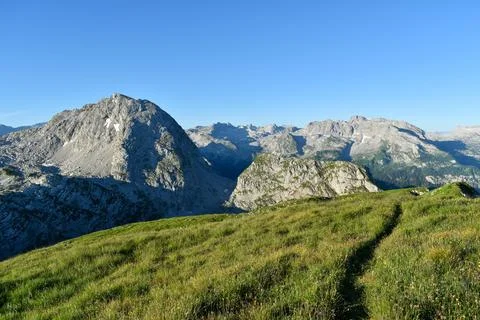 View from the summit meadow of the Fagstein to Kahlerberg and Steinernes Meer Stock Photos