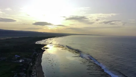 View of the sun setting on the beach Stock Footage 277682160