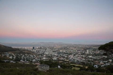 View of sun setting over City Bowl in Cape Town Stock Photos