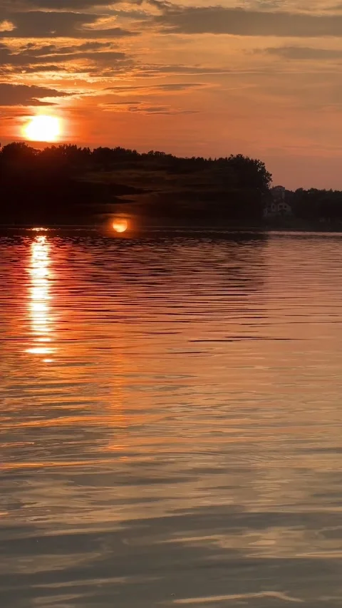 View of sunset above the lake Stock Footage 251863993