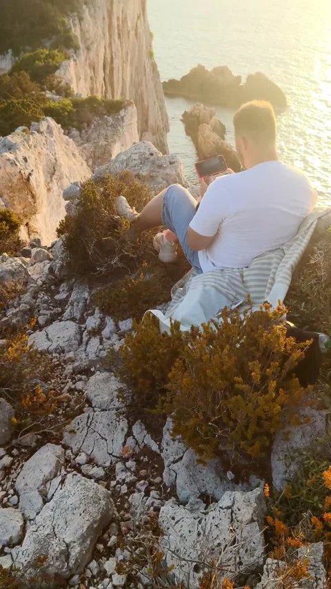 View of sunset above the sea lighthouse of Lefkada Greece Stock Footage 165507833