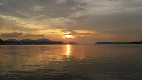 THE VIEW OF SUNSET ON THE BEACH Stock Footage 274496491