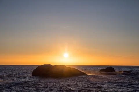 View of sunset with big rocks Foto stock