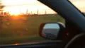View of sunset from driving car HD Footage