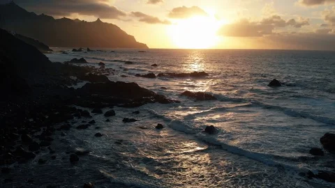 View of the sunset from the drone - Atlantic coast, island, waves in slow motion Stock Footage 108564217