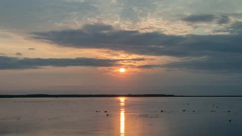 View of sunset on lake with colorful clouds. Stock Footage 150013046