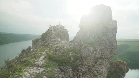 View of sunset over karst mountain rocks landscape in Ukraine Stock Footage 233712537