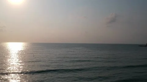 View of the sunset over the ocean. Sea waves in the sun. The concept of the Vídeos de archivo 141296552