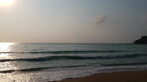 View of the sunset over the ocean. Sea waves in the sun. The concept of the Video stock 143076351