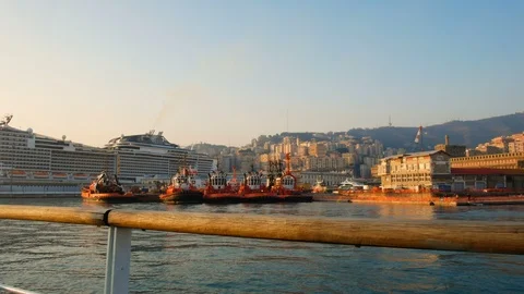 View at sunset over the old port of Genoa, towards the mountainous part Stock Footage 105636988