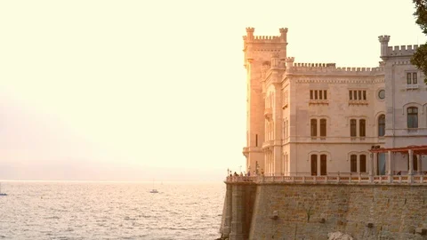 View on the sunset over the sea and Castello Miramare in Italy Video stock 89491537