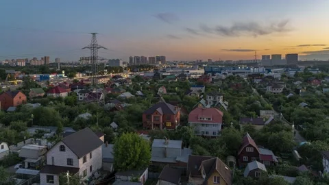 View of the sunset from the suburbs to the metropolis, time lapse Stock Footage 134902988