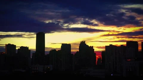 View of the sunsets in the city Stock Footage 305308018