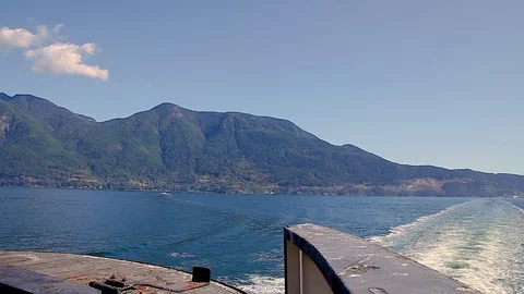 A view of the Sunshine Coast as seen from the deck of a ferry. Stock Footage 97465399