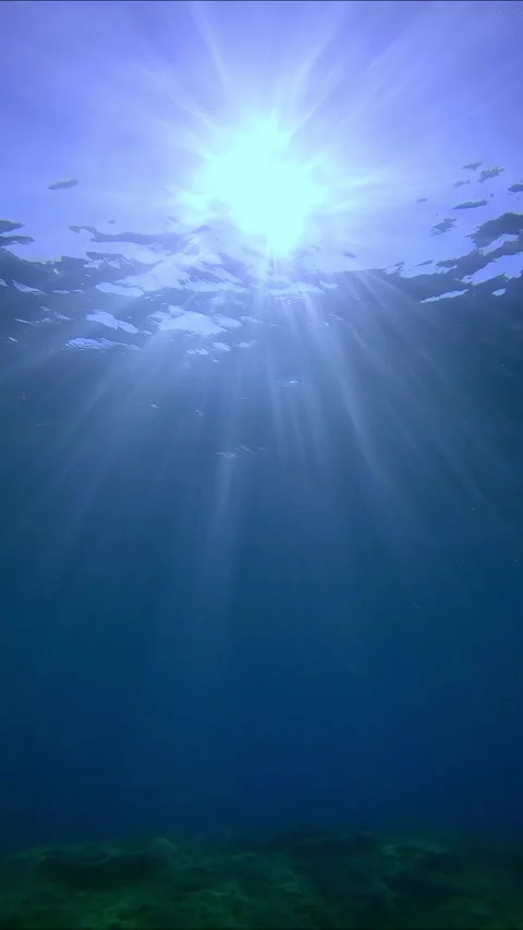 View of sunshine with ripples on waves surface from the deep, slow motion Stock Footage 255110595
