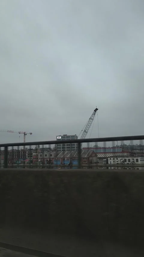 View of the surroundings of the city Antwerp when driving in the road E19 Stock Footage 340397927