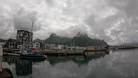 View of Svolvaer harbour, overcast clouds and misty mountains in Lofoten 動画素材 343834206
